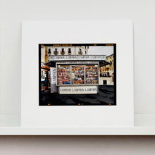 Load image into Gallery viewer, News Stand Milan, Italian street photography by Richard Heeps. mounted square.