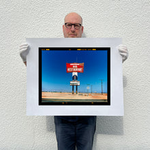 Load image into Gallery viewer, Richard Heeps holding Sundowner Salton Sea California print.