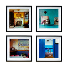 Load image into Gallery viewer, Four black framed photographs by Richard Heeps. From Richard&#39;s series Ordinary Places, the four photos capture vintage indoor scenes. The first one is a sitting room with a fireplace and candlesticks, the second a shelf with a mirror and a small bunch of flowers, the third is in the Fisherman&#39;s mission in the cafe with an old tv sitting in the corner, the fourth is through a blue door and you see a chair sitting by itself.