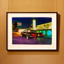 Load image into Gallery viewer, Black framed photograph by Richard Heeps. This photograph is hung on a wall and depicts a Chevy Bel Air central shot and off to the right are the pools and balcony of the Glass Pool Motel, Las Vegas.