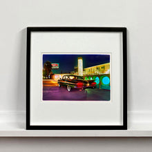 Load image into Gallery viewer, Black framed photograph by Richard Heeps. A Chevy Bel Air is central shot and off to the right are the pools and balcony of the Glass Pool Motel, Las Vegas.