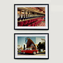 Load image into Gallery viewer, Two black framed photographs by Richard Heeps. The top photograph is one which shows a line of slot machines from a vintage casino in Las Vegas. The photograph at the bottom is a red vintage car sitting outside the Riviera building in Las Vegas.
