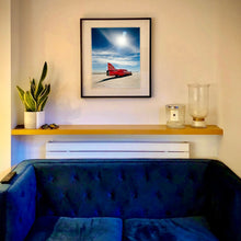 Load image into Gallery viewer, In situ photograph by Richard Heeps. A red drag car with a 75 written on its fin sits on a salt plain the front facing away towards the right. A blue cloudy sky is overhead.