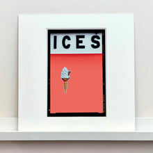 Load image into Gallery viewer, Mounted photograph by Richard Heeps.  At the top black letters spell out ICES and below is depicted a 99 icecream cone sitting left of centre against a melondrama red orange coloured background.  