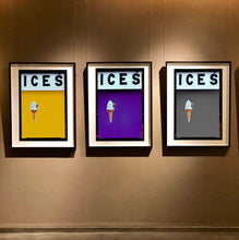 Load image into Gallery viewer, Set of three photographs by Richard Heeps.  Three identical photographs (apart from the block colour), at the top black letters spell out ICES and below is depicted a 99 icecream cone sitting left of centre set against, in turn, a mustard yellow, purple and grey coloured background.  