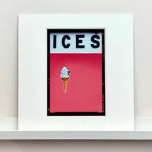 Load image into Gallery viewer, Mounted photograph by Richard Heeps.  At the top black letters spell out ICES and below is depicted a 99 icecream cone sitting left of centre against a coral coloured background.  