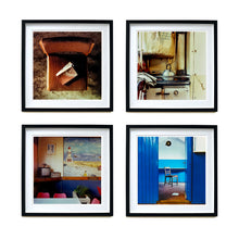 Load image into Gallery viewer, Four black framed photographs by Richard Heeps. The first photograph looks down on a brown padded side chair. On it sits a waterstained and battered brown covered Holy Bible. The second photograph is an old aga with a metal kettle on top. The third is a cafe with a sea side painting on the wall, the fourth is a chair sitting alone in a blue room.