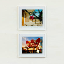 Load image into Gallery viewer, Two white framed photographs by Richard Heeps. On top a photograph of a flowering bougainvillea hangs outside a motel entrance.  On the bottom is a LaConcha Motel Vacancy sign with a Budget rent a car sign underneath taken in a golden setting sun.