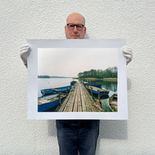 Load image into Gallery viewer, Richard Heeps holding Ormesby Little Broad Norfolk print.