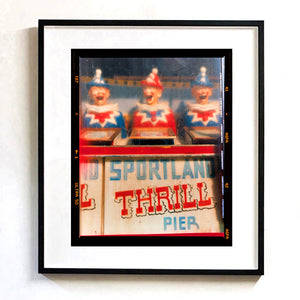 Thrill Pier clowns amusements photograph by Richard Heeps framed in black