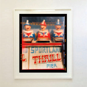 Thrill Pier clowns amusements photograph by Richard Heeps framed in white