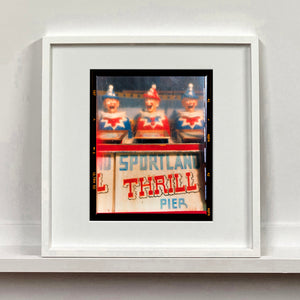Thrill Pier clowns amusements photograph by Richard Heeps mounted square framed in white