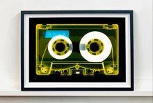 Load image into Gallery viewer, Tape Collection, &#39;AILA Tinted Yellow&#39;. The Heidler &amp; Heeps collaborations are creative representations of Natasha Heidler and Richard Heeps’ personal past, and their personalities. Tapes are significant in both their lives and the work here is made from their own collections. Their unique process makes these artworks not inanimate objects, rather they have depth, texture, grit, and they even appear to move.