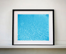 Load image into Gallery viewer, &#39;Algiers Pool&#39;, photographed by Richard Heeps in Las Vegas, is the perfect way to bring summer vibes into your home all year round. The glistening pool water is idyllic and inviting.  