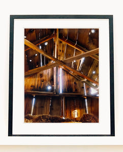 Light breaks through the cracks in the barn on the movie set of Clint Eastwood's Western film 'The Outlaw Josey Wales'. Captured in Kanab, Utah, which was the setting of many Western movies. Photographed by Richard Heeps for his 'Dream in Colour' series.
