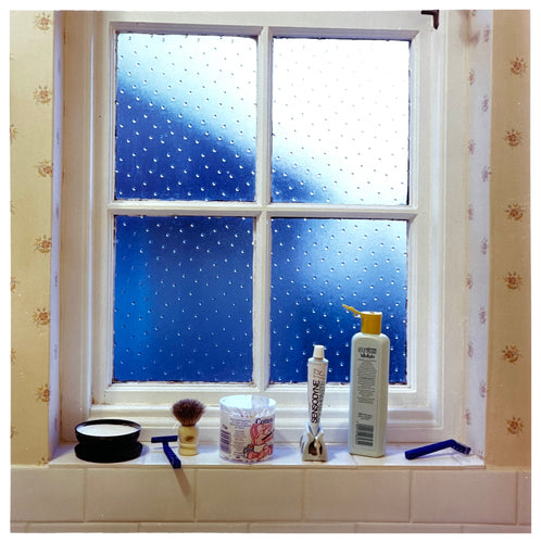 Photograph by Richard Heeps.  A frosted bathroom windowsill photographed in 1989 with toiletries sitting on the sill.