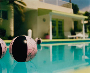Part of Richard Heeps' 'Dream in Colour' Series, 'Beach Ball' captures Palm Springs mid-century modern architecture behind a trio of pink and black beach balls. The stillness and the subtle colours combine to make a calming artwork with a seductive cinematic vibe.