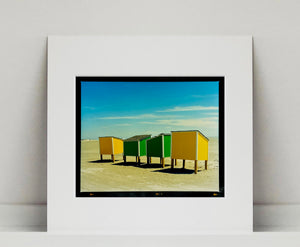 'Beach Lockers' was captured on a glorious spring day in Wildwood, New Jersey. It features bold yellow and green shapes against a beach and bright blue sky. Taken in 2013, this photograph was first executed in Richard's darkroom in April 2020. Colour is key in Richard's work, and through the simplicity of this artwork, it really shows. Whilst photographing on the East Coast of America, Richard drew parallels of familiarity to the East Coast of England.