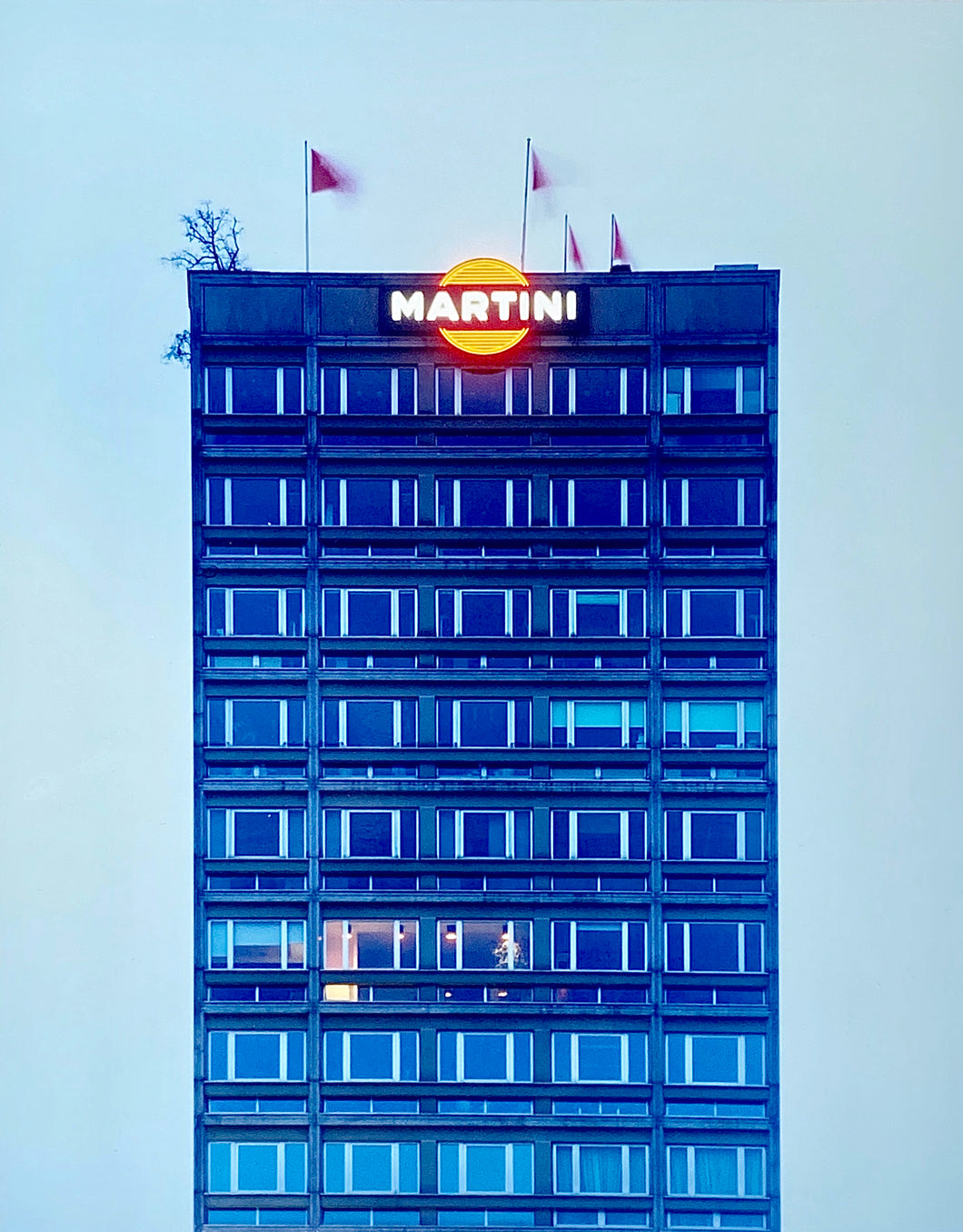 Central Milan's rooftop bar Terazza Martini, is the subject of Richard Heeps' 'Blue Martini, Milan, 2019', taken as part of his series 'A Short History of Milan'. There is a reoccurring linear, structural theme throughout the series, capturing the Milanese use of materials in design such as glass, metal, wood and stone. 