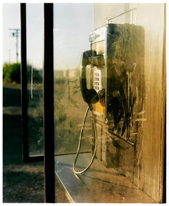 Photograph by Richard Heeps.  An American roadside phone booth.