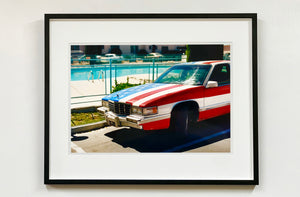 An American car parked up by the swimming pool outside the Algiers Hotel in Las Vegas. Photography by Richard Heeps, part of his 'Dream in Colour' series.