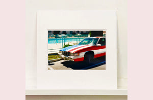 An American car parked up by the swimming pool outside the Algiers Hotel in Las Vegas. Photography by Richard Heeps, part of his 'Dream in Colour' series.