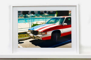 An American car parked up by the swimming pool outside the Algiers Hotel in Las Vegas. Photography by Richard Heeps, part of his 'Dream in Colour' series.