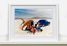 Load image into Gallery viewer, &#39;Christine&#39;s &#39;52 Henry J &amp; teardrop&#39; was captured in Bonneville Salt Flats, Utah, the iconic home of speed. This photograph shows the mountains in the distance meeting and contrasting with the flatness of the salt pan, whilst a pair of retro spectators look out at the speeding cars in the distance.