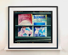 Load image into Gallery viewer, As part of Richard Heeps&#39; series, A Short History of Milan, Desire features Italian books from a street kiosk. 