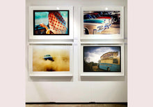 Load image into Gallery viewer, A moody Fenland sky is backdrop to a classic British Fish &amp; Chips Van. The typography and the van itself has a fun fairground feel, contrary to the muted tones of this piece. Part of Richard Heeps series, &#39;A View of the Fens from the Car with Wings&#39;.