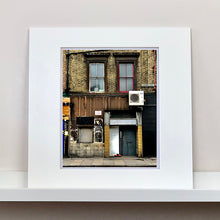 Load image into Gallery viewer, East London brick building mounted architecture street photography by Richard Heeps.