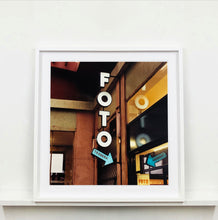 Load image into Gallery viewer, A vintage neon sign outside of a Foto Studio in Milan.