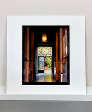 Load image into Gallery viewer, An Art Deco entrance hall in Milan, featuring blue stained glass panelling and marble flooring.