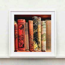 Load image into Gallery viewer, Vintage book spines photograph framed in white by Richard Heeps.
