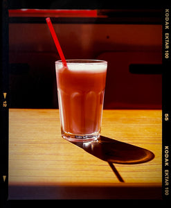 This enticing pink milkshake in a glistening glass was photographed by Richard Heeps in a Clacton-on-Sea cafe. The composition of this artwork is beautifully balanced by the angles of the red straw and shadow. 