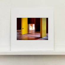 Load image into Gallery viewer, Monte Amiata housing, Gallaratese Quarter, Milan. Mounted yellow brutalist architecture photograph by Richard Heeps.