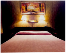 Load image into Gallery viewer, An ongoing subject of Richard&#39;s photography is the motel room. In this instance, photographed at the Lariat Motel in Fallon, Nevada. It is also often a significant location within American film and TV culture. For example, It is the backdrop for the iconic scene in the Hollywood film psycho. In this atmospheric image, the bed lights are joined together conveying a sense of coupling.
