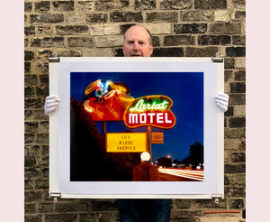 'Lariat Motel II' is a classic Richard Heeps Americana 'Sign Porn' artwork. It was captured in its original site in Fallon, Nevada. The owners since sold the Lariat Motel and donated the 1950's sign with original neon tubing to the Churchill Arts Council. This photograph forms part of Richard Heeps' 'Dream in Colour' series.