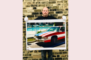 An American car parked up by the swimming pool outside the Algiers Hotel in Las Vegas. Photography by Richard Heeps, part of his 'Dream in Colour' series.