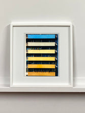 Load image into Gallery viewer, &#39;Rainbow Apartments&#39; captures Italian design and architecture, showing a multi-coloured nineteen-sixties block of flats. This artwork is part of Richard Heeps&#39; series &#39;A Short History of Milan&#39; which began in November 2018 for a special project featuring at the Affordable Art Fair Milan 2019, and the series is ongoing. There is a reoccurring linear, structural theme throughout the series, capturing the Milanese use of materials in design such as glass, metal, wood and stone. 