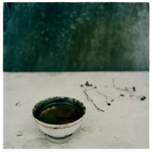 Load image into Gallery viewer, &#39;Rice Bowl&#39; was captured in the final years of British Hong Kong, in a colonial home on the Peak. This delicate still life artwork, made up equally of neutral tones and a beautiful deep green, is a subtle depiction of Yin and Yang.