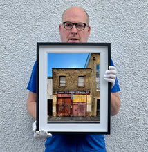 Load image into Gallery viewer, East London industrial brick architecture street photography by Richard Heeps framed in black.