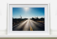 Load image into Gallery viewer, &#39;Road to Gunsight&#39; photographed on Highway 86, Arizona in 2001 is part of Richard Heeps&#39; &#39;Dream in Colour&#39; series. This classic American open road imagery appears throughout his work. 
