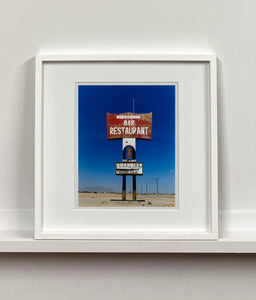 This giant isolated roadside sign set against a vast blue sky is a remnant of 'The Sundowner Bar and Restaurant' of the motel which is sadly no more. This photograph, part of Richard Heeps' 'Salton Sea' series captures the landscape of the western side of the lake.