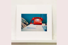 Load image into Gallery viewer, &#39;Telephone VI, Ballantines Movie Colony&#39; is part of Richard Heeps&#39; &#39;Dream in Colour&#39; series. This cool Palm Springs interior artwork features a vintage telephone on a nightstand, combining gorgeous colours with a nostalgic mid-century feel.