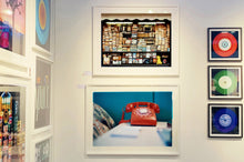 Load image into Gallery viewer, &#39;Telephone VI, Ballantines Movie Colony&#39; is part of Richard Heeps&#39; &#39;Dream in Colour&#39; series. This cool Palm Springs interior artwork features a vintage telephone on a nightstand, combining gorgeous colours with a nostalgic mid-century feel.