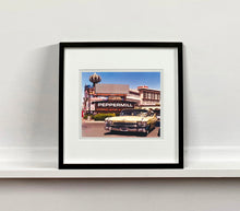 Load image into Gallery viewer, &#39;The Silver State&#39; was taken by Richard whilst at Viva Las Vegas 2001, where he was photographing for Classic American magazine. This photograph which shows a vintage car in front of a typical Las Vegas backdrop was chosen as the lead image for the magazine feature which focused on the iconic La Concha motel.