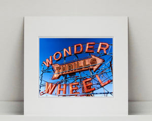 'Thrills', shot in Coney Island, new York. This iconic Wonder Wheel is a universal symbol of fun and will bring a sense of energy and excitement into any room. This artwork was selected for the 250th Royal Academy Summer Exhibition 2018.