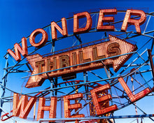 Load image into Gallery viewer, &#39;Thrills&#39;, shot in Coney Island, new York. This iconic Wonder Wheel is a universal symbol of fun and will bring a sense of energy and excitement into any room. This artwork was selected for the 250th Royal Academy Summer Exhibition 2018.