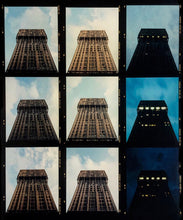 Load image into Gallery viewer, Photograph by Richard Heeps. The 1950s skyscraper, the Torre Valesca, is photographed throughout the day. Captured in the same position 9 times during the day, moving from top left, morning, to bottom right, night.